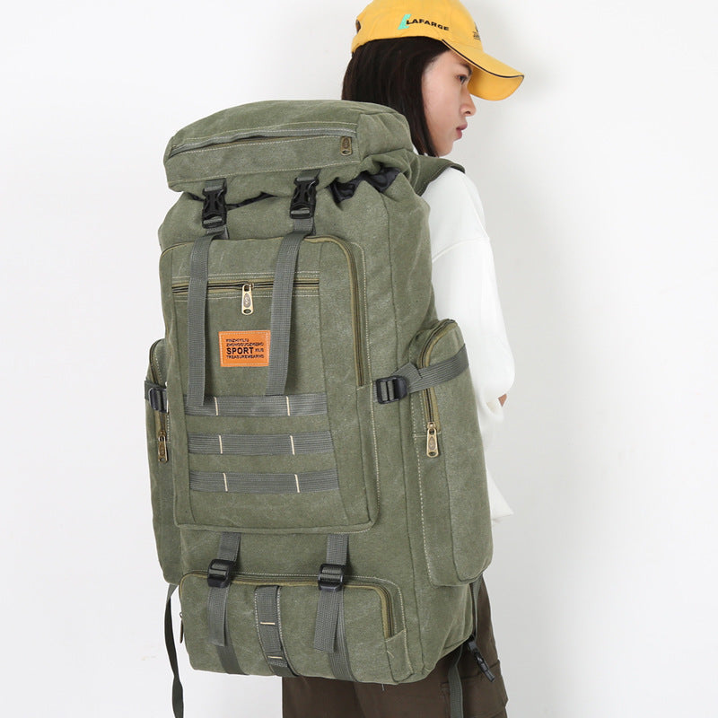 Large-Capacity Waterproof Canvas Rucksack – Multifunctional Mountaineering Bag with 15-Inch Laptop Storage