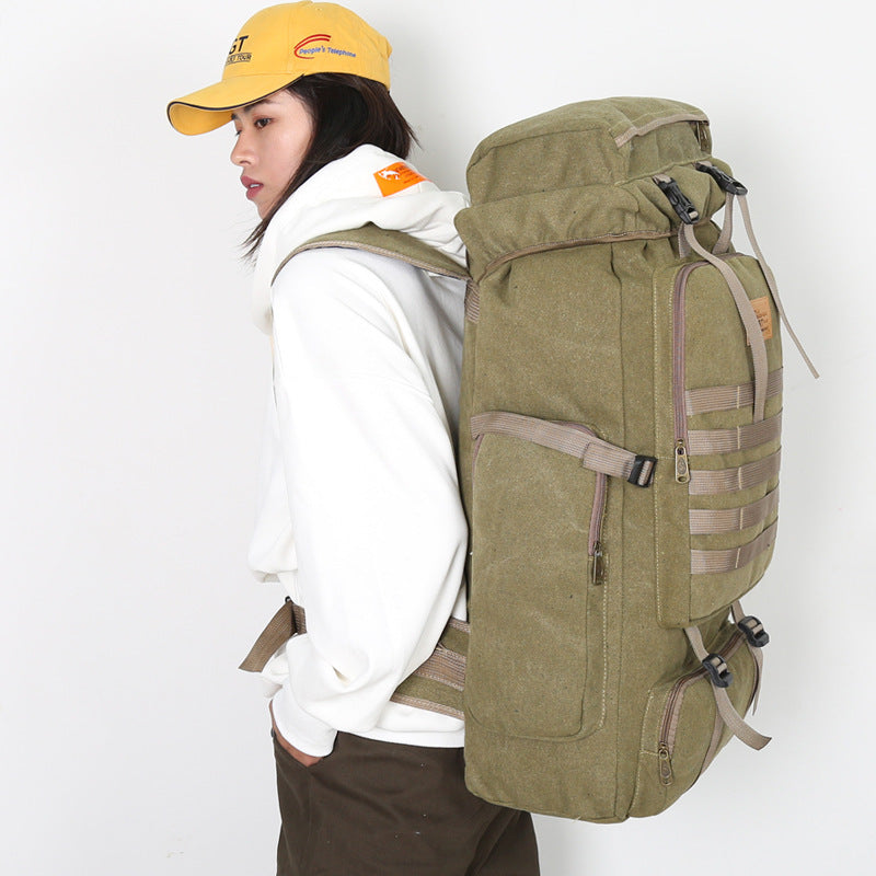 Large-Capacity Waterproof Canvas Rucksack – Multifunctional Mountaineering Bag with 15-Inch Laptop Storage