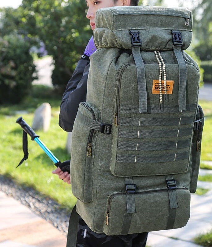 Large-Capacity Waterproof Canvas Rucksack – Multifunctional Mountaineering Bag with 15-Inch Laptop Storage
