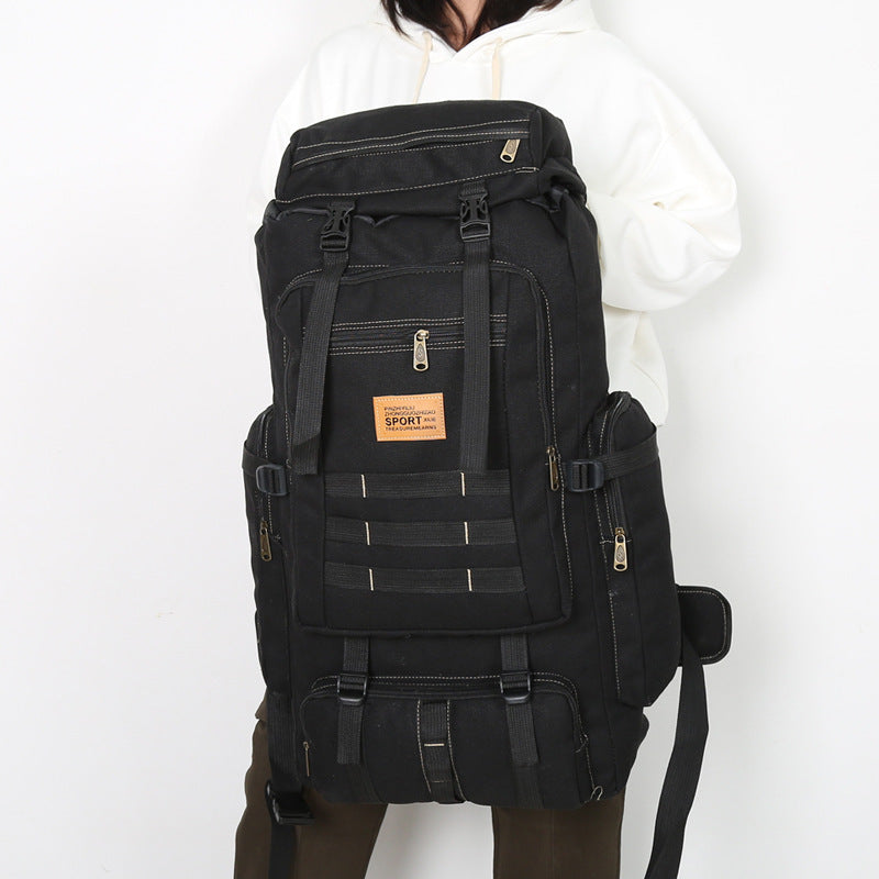 Large-Capacity Waterproof Canvas Rucksack – Multifunctional Mountaineering Bag with 15-Inch Laptop Storage